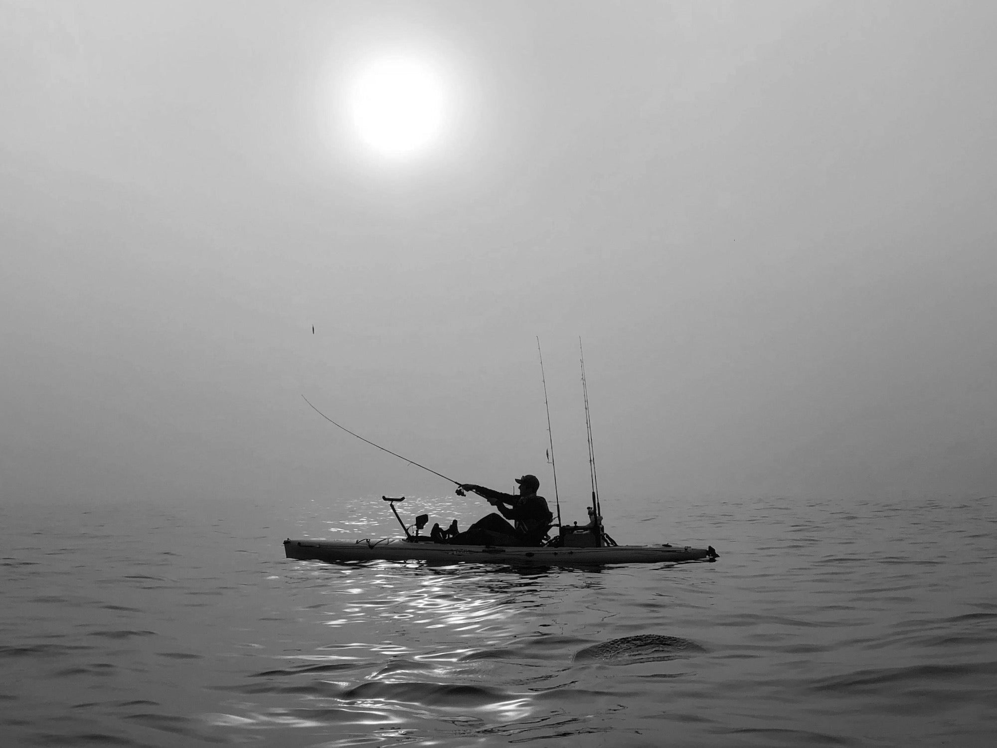 Kayak Angler Casting A Line - Liam Wild Seas