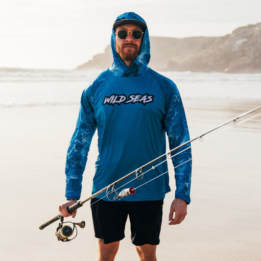 Sam wearing the Wild Seas Performance UV Hoodie whilst fishing